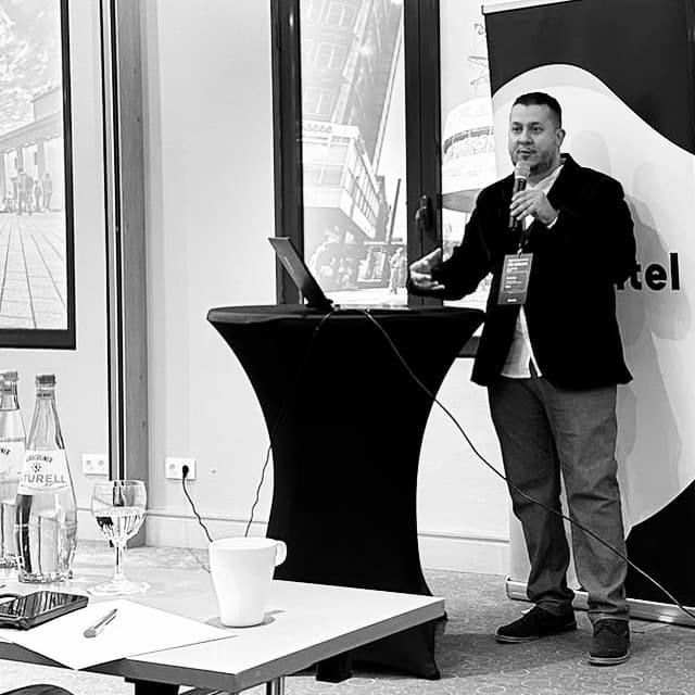 Mo Mamdouh presenting at a technology conference